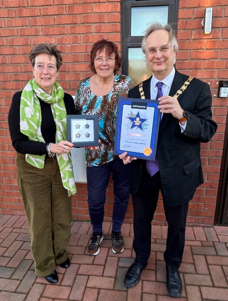 Caring Hands receiving their Community Stars awards